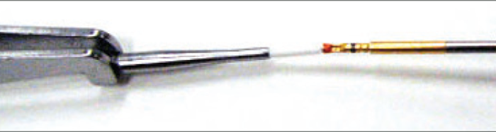 contact insertion tool - Metal tool with contact.